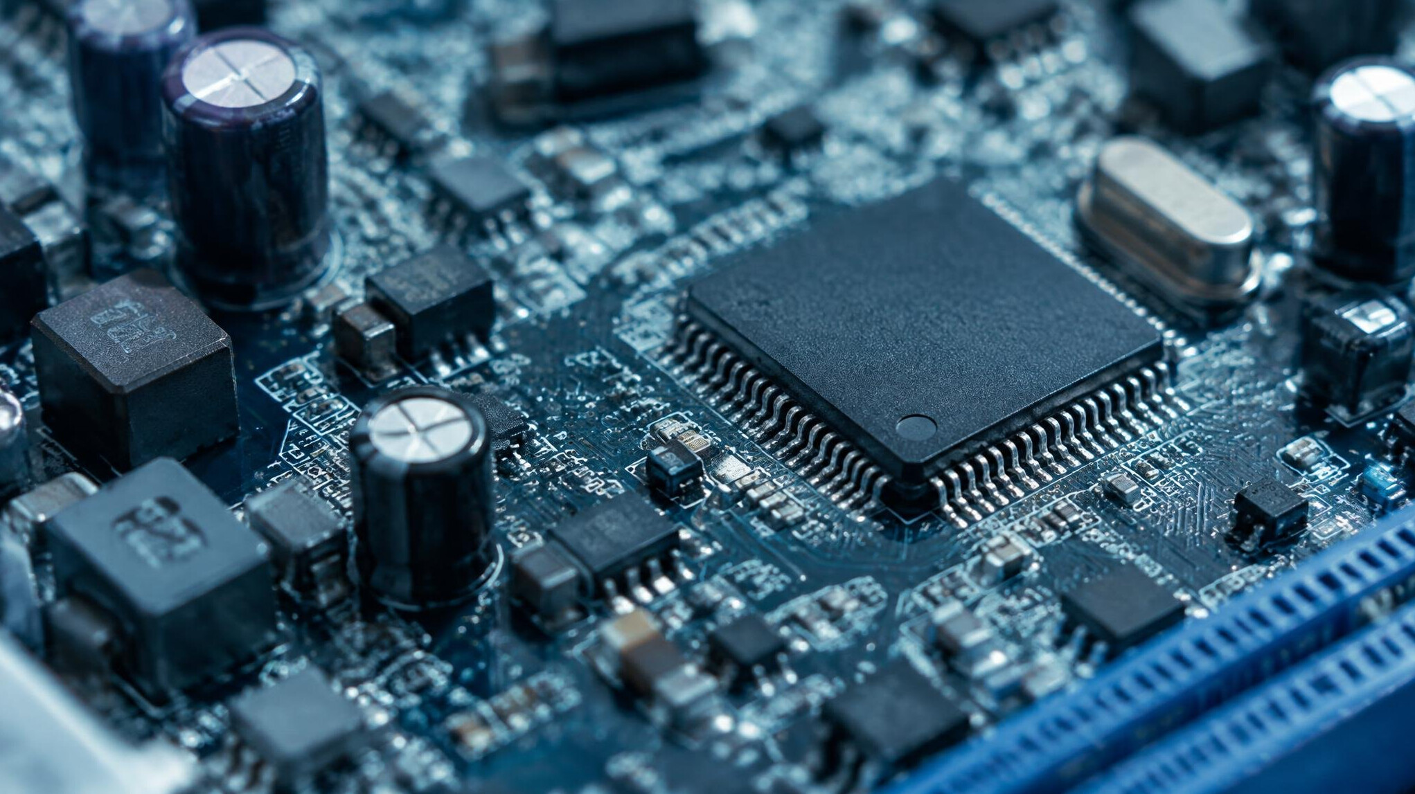 Close-up of a green circuit board with electronic components